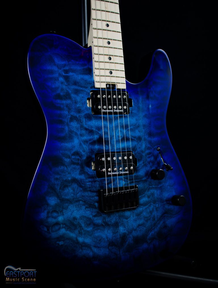 A blue electric guitar with black accents on it's body.