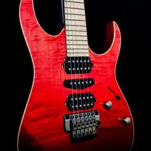 A red guitar with black trim and strings.