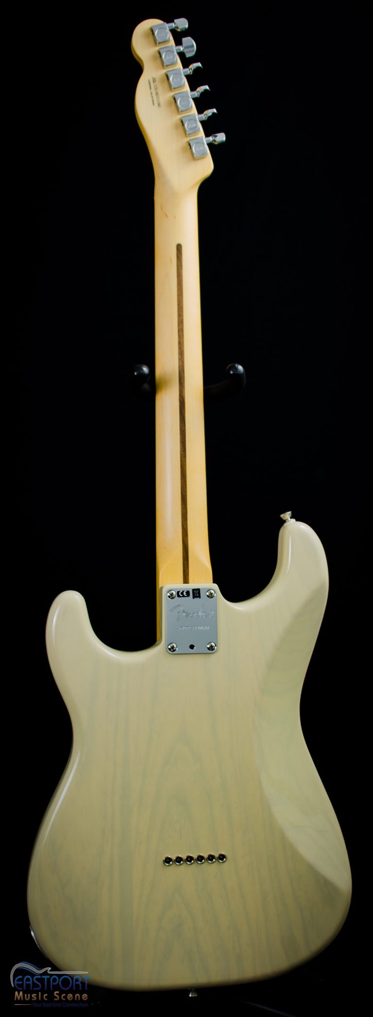 A white electric guitar with two pickups.
