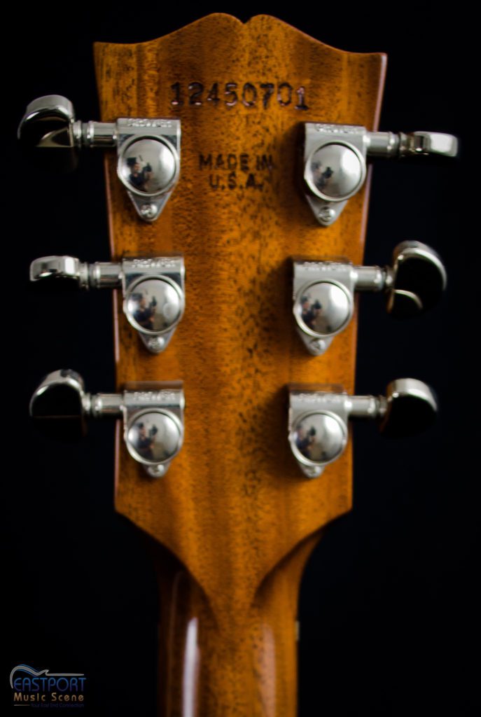 A close up of the headstock on an electric guitar