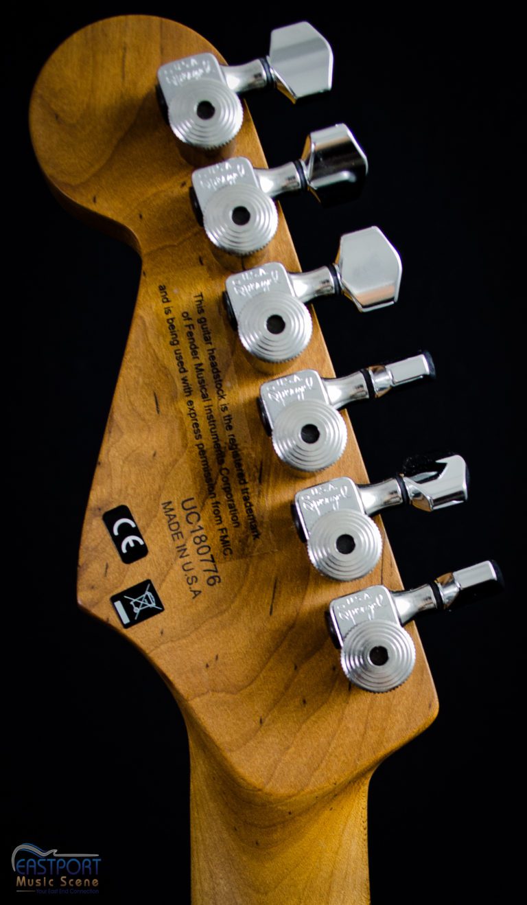 A guitar with the headstock and tuners attached.