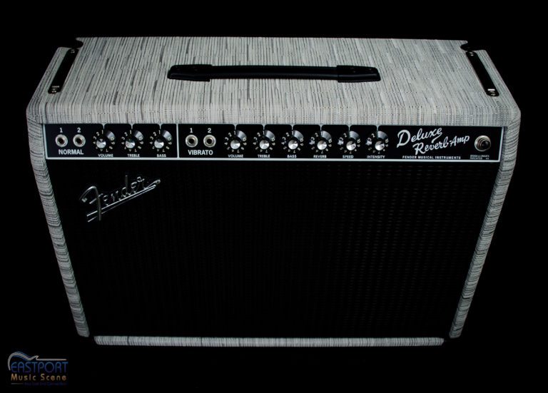 A black and white guitar amp with the top of it.
